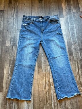 Risen Jeans High-Rise Blue Flare Jeans with Raw Hem